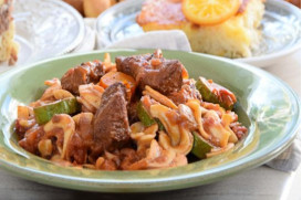 Veal stew with vegetables cooked in red wine and chylopites pasta from Arahova
