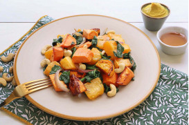 Mixed-up vegetables with red pumpkin, spinach, sweet potato, cashews and honey