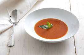 Tomato soup with fresh tomato and basil